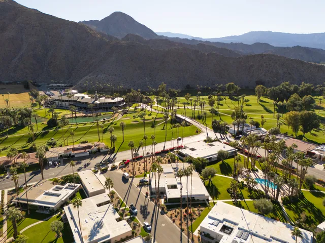 a view of a swimming pool with a mountain