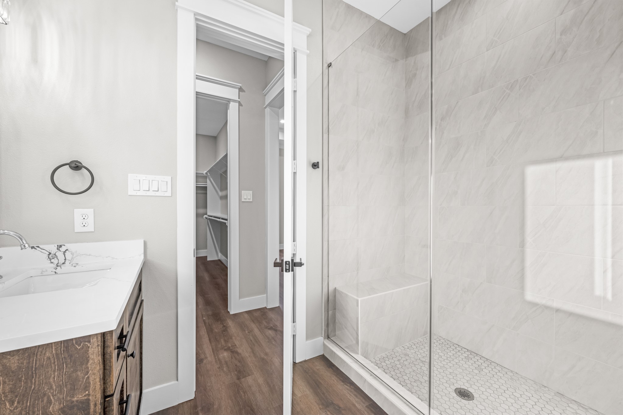 93 Longhorn Loop New Waverly, TX 77358 - Photo 31 of 47 a bathroom with a sink and a mirror
