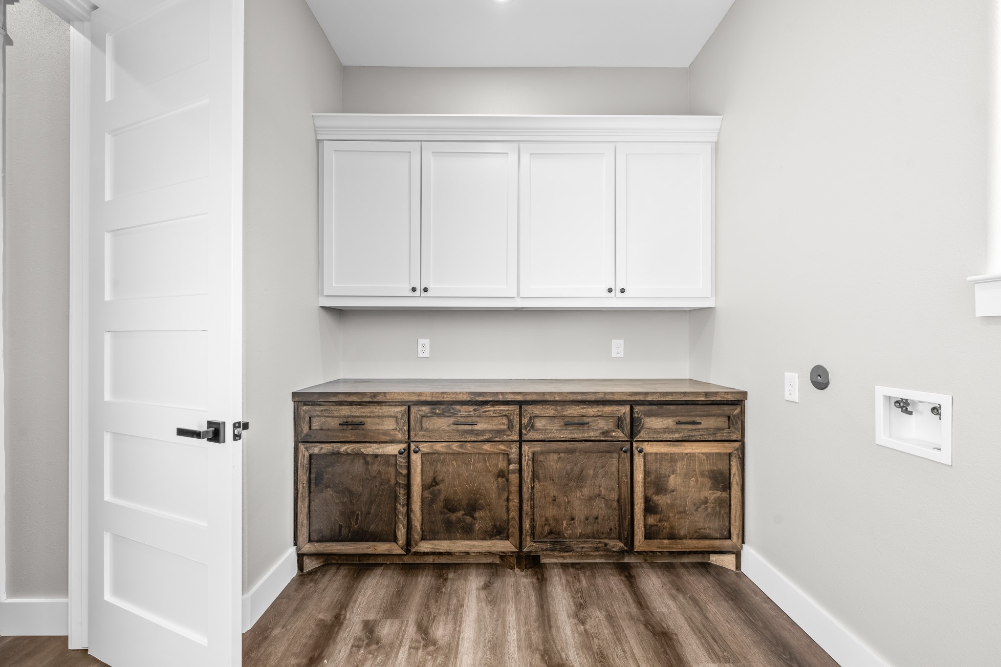 93 Longhorn Loop New Waverly, TX 77358 - Photo 33 of 47 a view of a kitchen with white cabinets