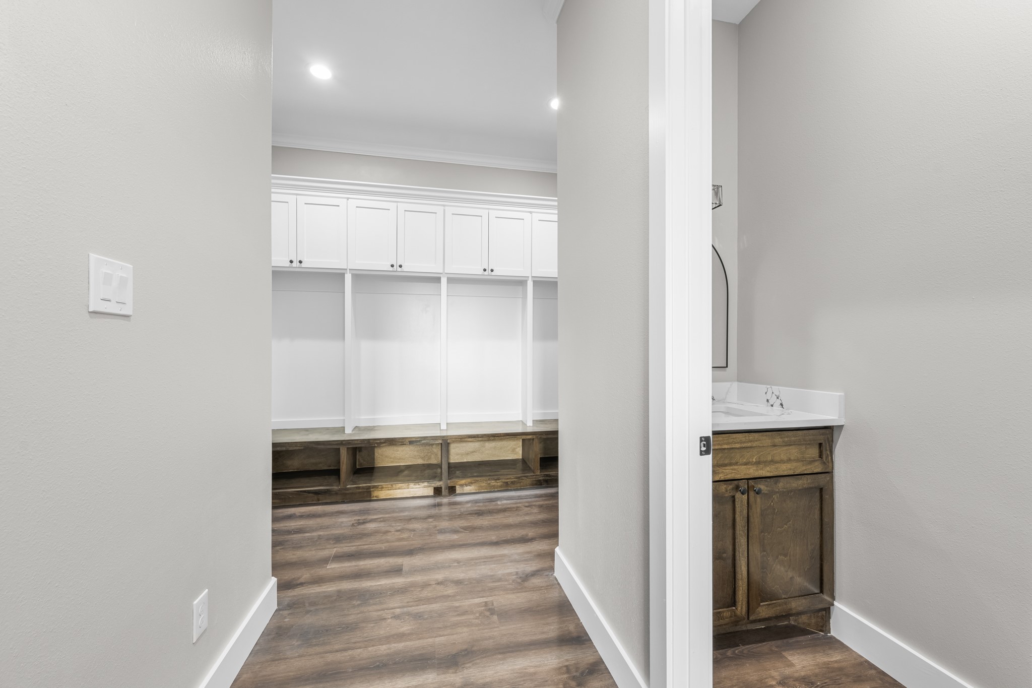 93 Longhorn Loop New Waverly, TX 77358 - Photo 34 of 47 a view of a hallway with wooden floor and closet