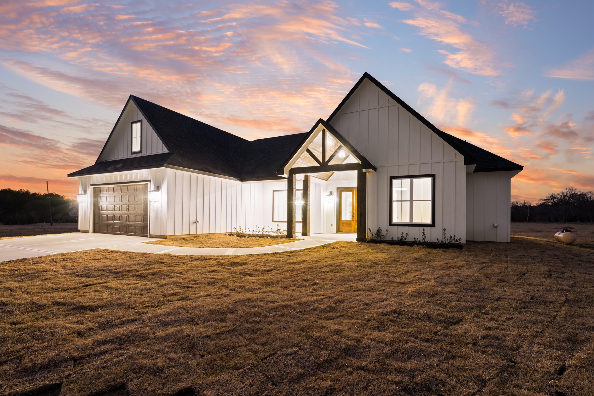 93 Longhorn Loop New Waverly, TX 77358 - Photo 44 of 47 a front view of a house with a yard