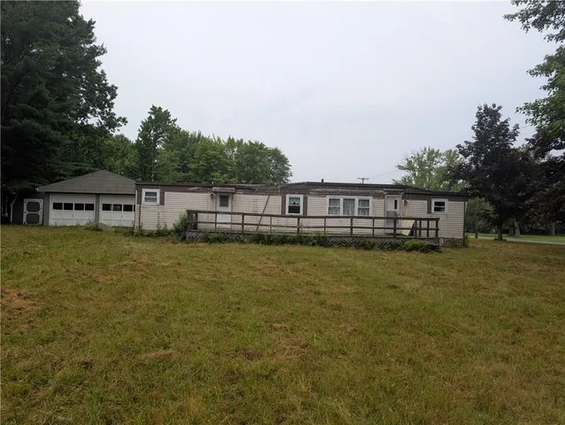 a balcony with a garden and entertaining space