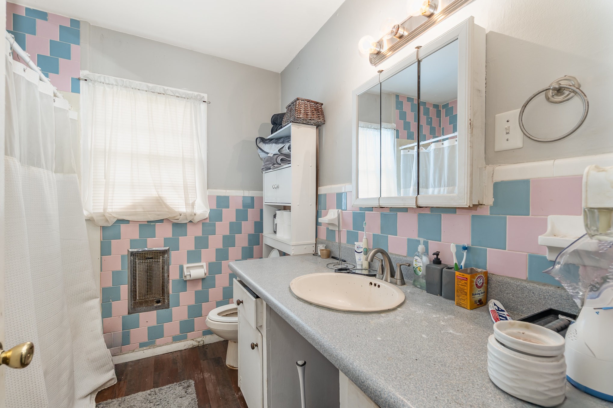 413 Dorris Avenue Springfield, TN 37172 - Photo 12 of 18 a bathroom with a granite countertop sink and a mirror