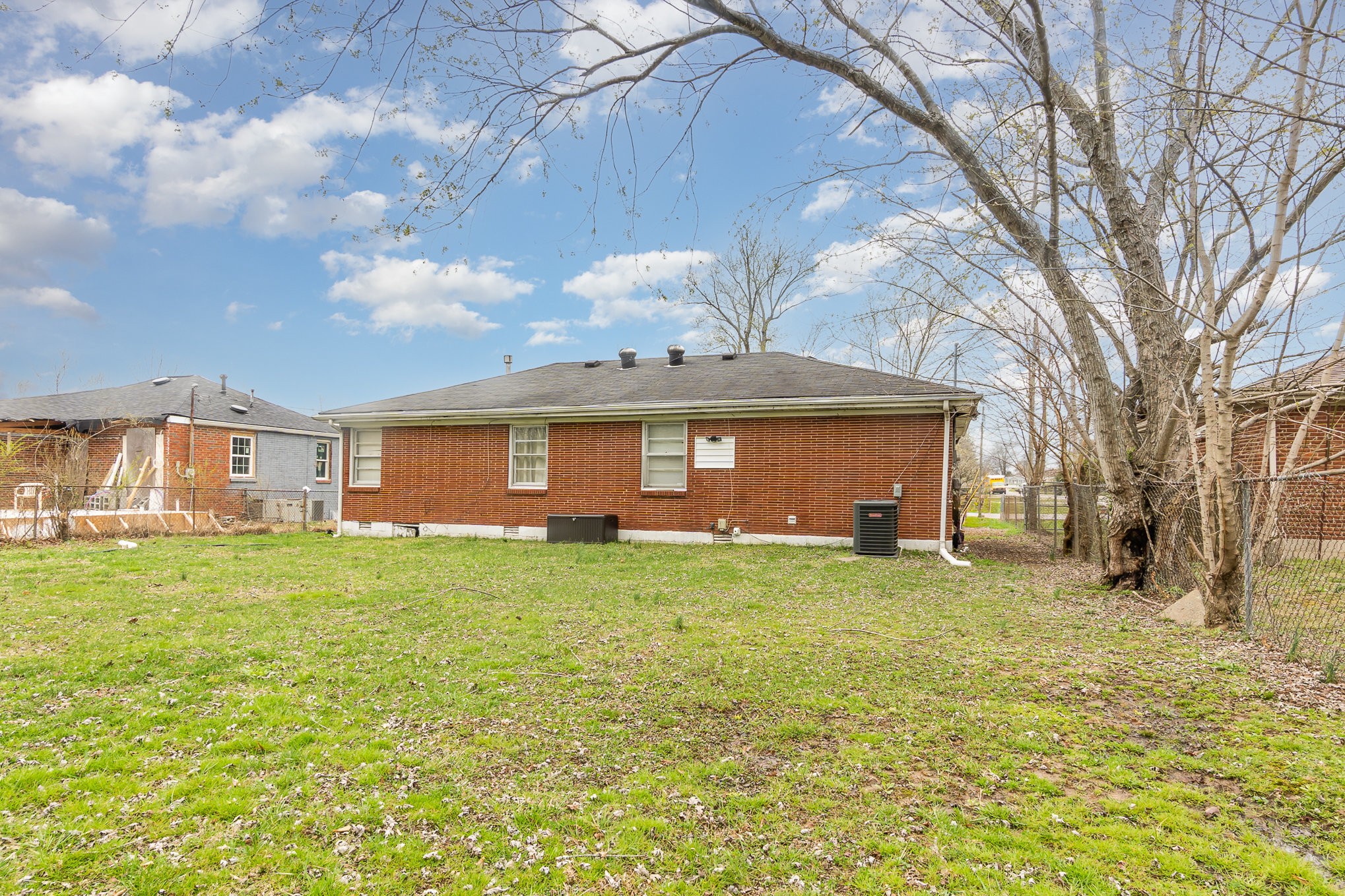 413 Dorris Avenue Springfield, TN 37172 - Photo 15 of 18 a view of a yard with a house and a large tree