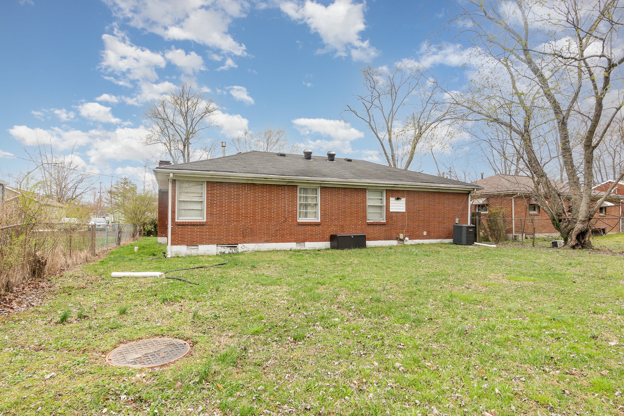 413 Dorris Avenue Springfield, TN 37172 - Photo 16 of 18 a view of a backyard with a garden and plants