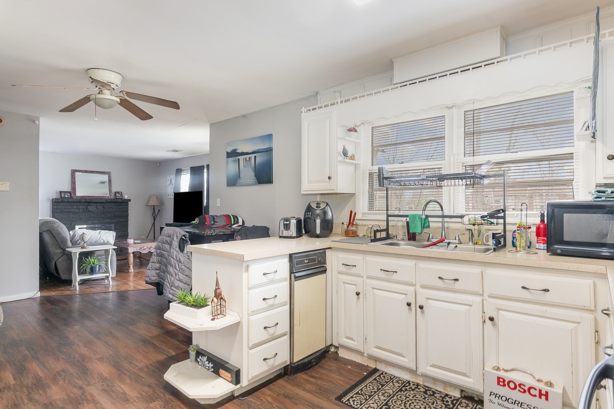 413 Dorris Avenue Springfield, TN 37172 - Photo 7 of 18 a kitchen with white cabinets and sink