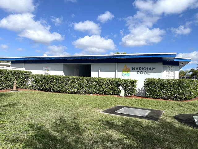 a view of a garden with a building