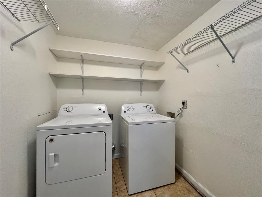 1716 West Nassau Street Tampa, FL 33607 - Photo 21 of 25 a utility room with dryer and washer