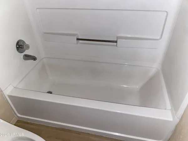 a bathroom with a toilet and a sink