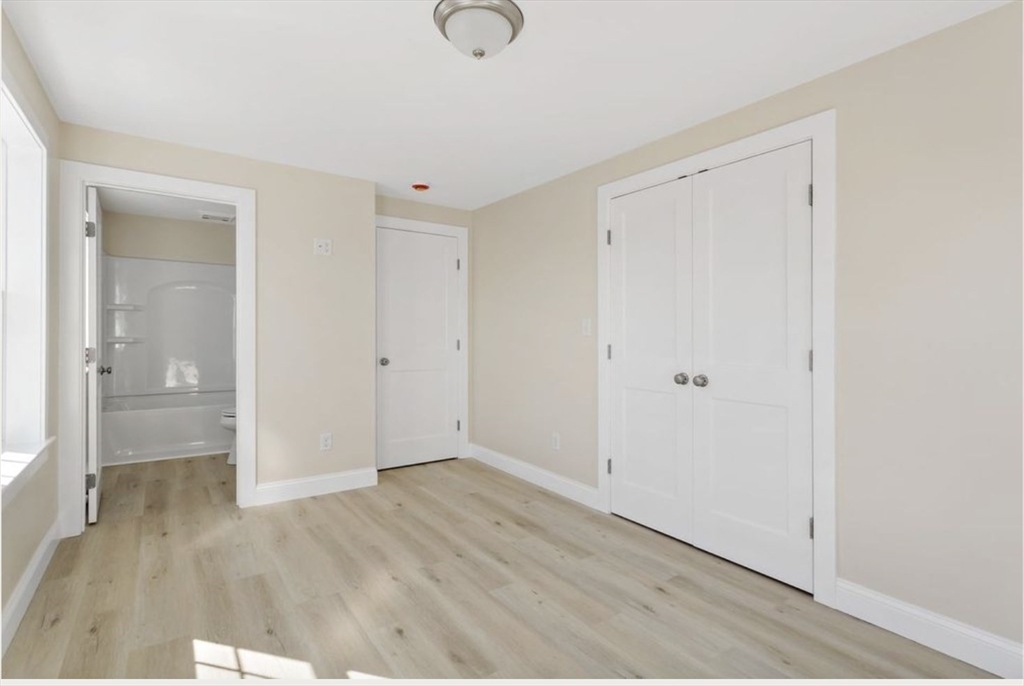 209 Main Street, Unit 6 Dennis, MA 02670 - Photo 21 of 27 a view of an empty room