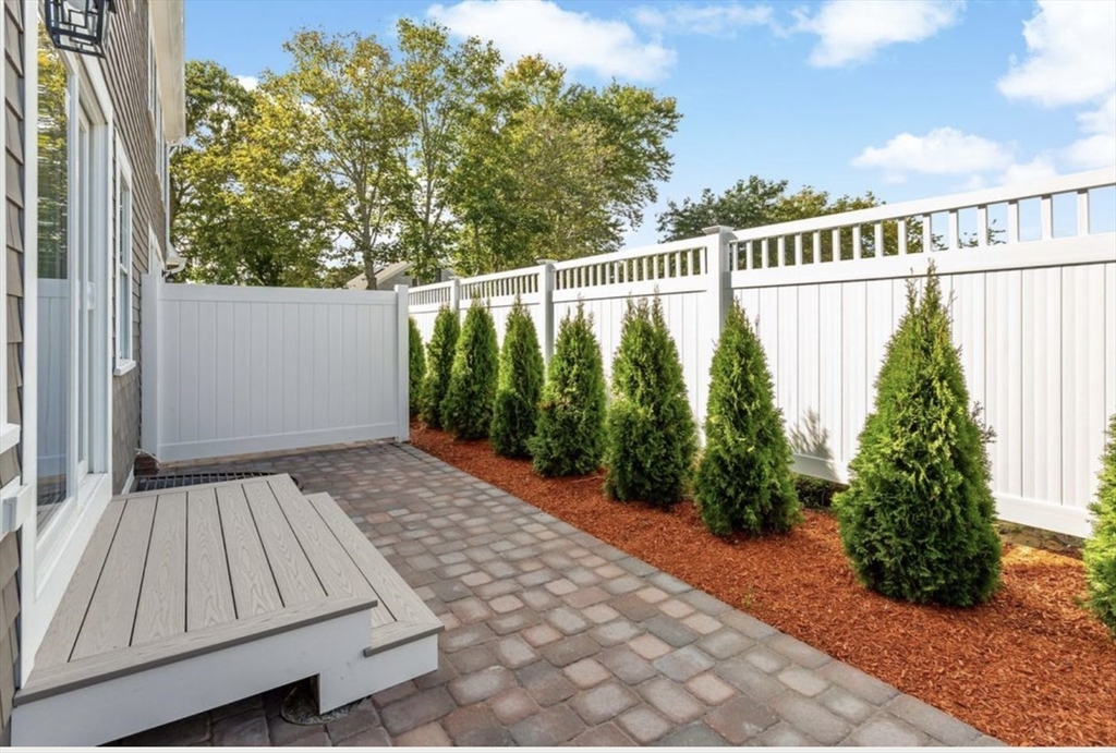 209 Main Street, Unit 6 Dennis, MA 02670 - Photo 8 of 27 a view of a balcony with plants