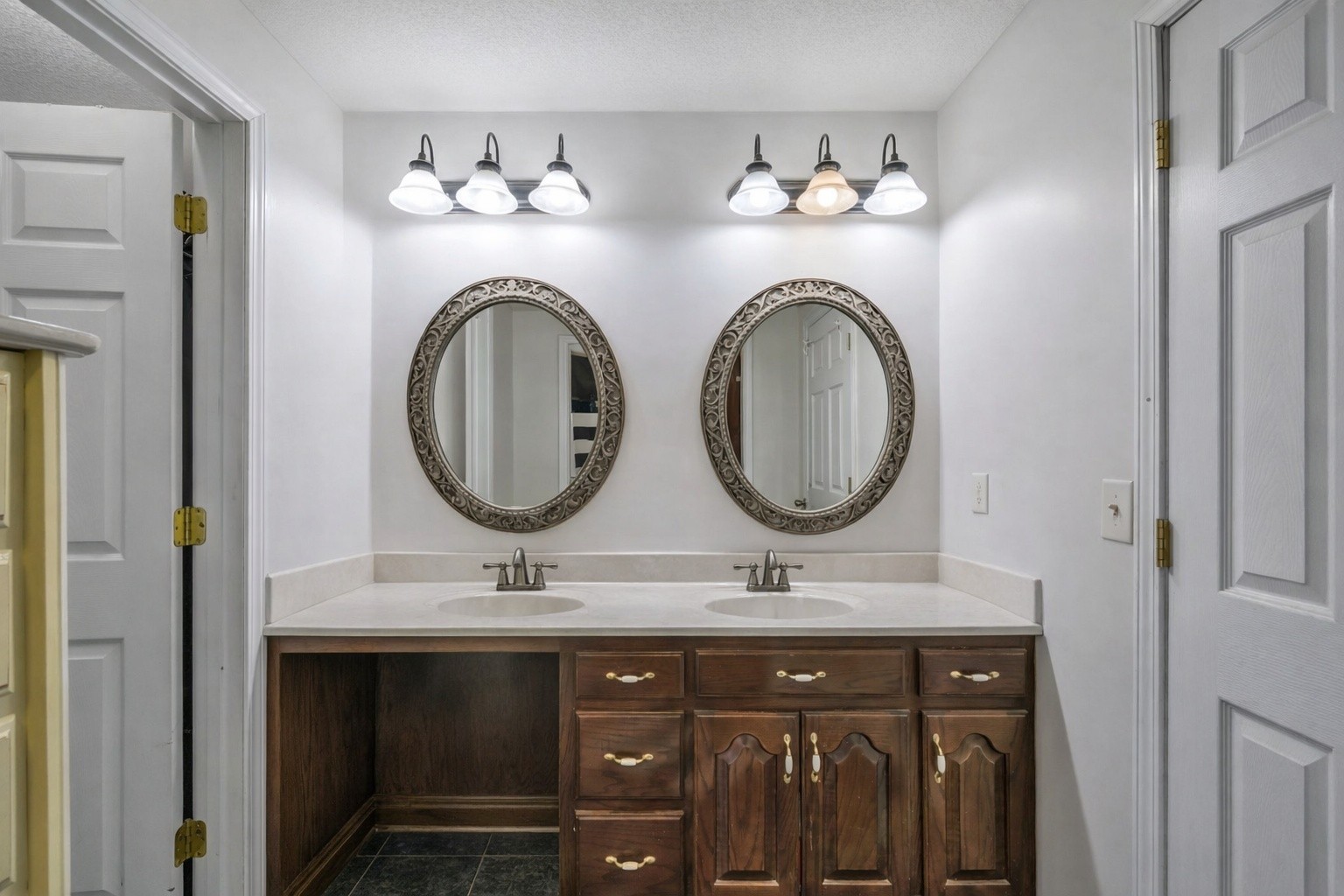 311 Downs Road Cumberland City, TN 37050 - Photo 15 of 31 a bathroom with a sink and a mirror