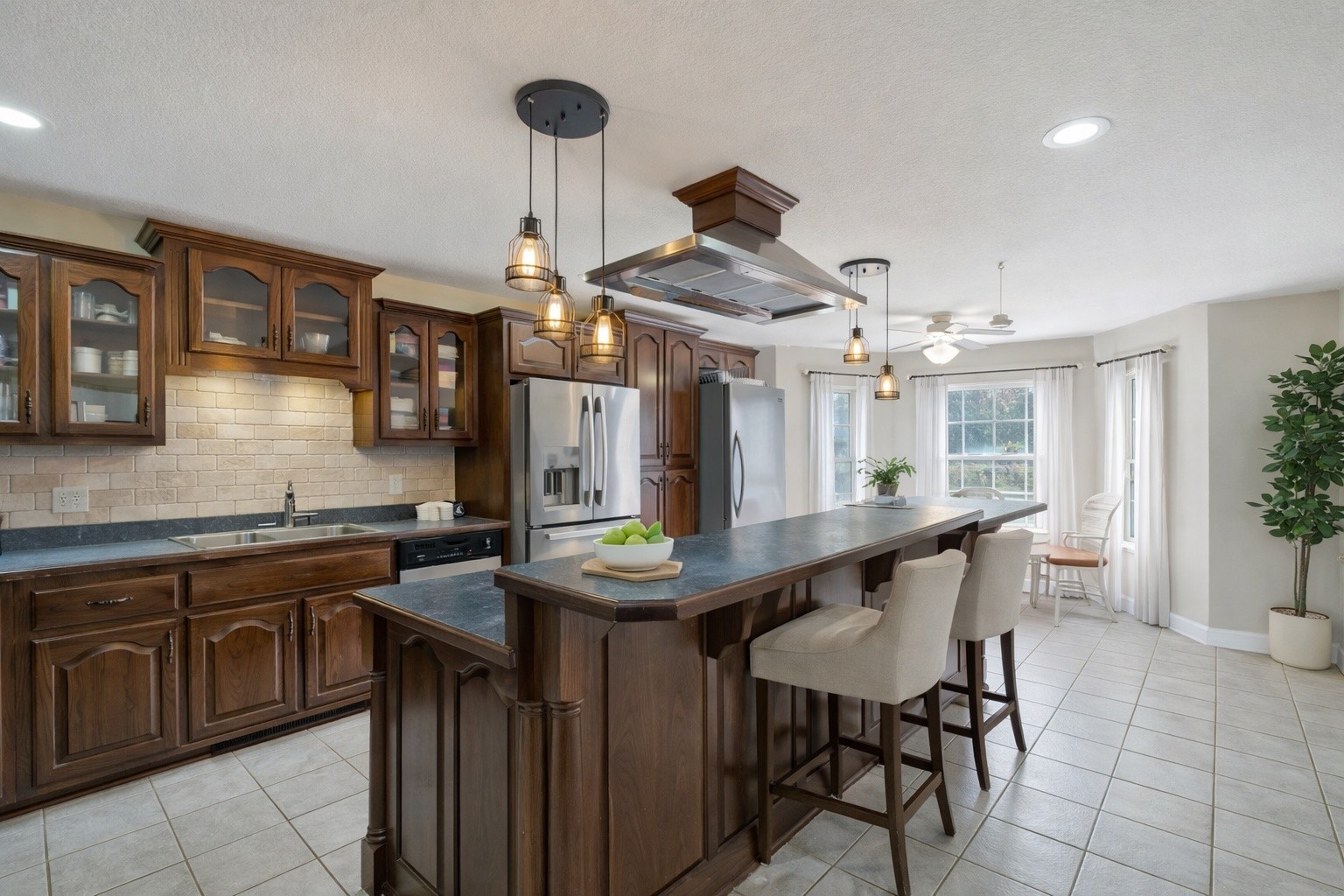 311 Downs Road Cumberland City, TN 37050 - Photo 8 of 31 a kitchen with a table and chairs in it