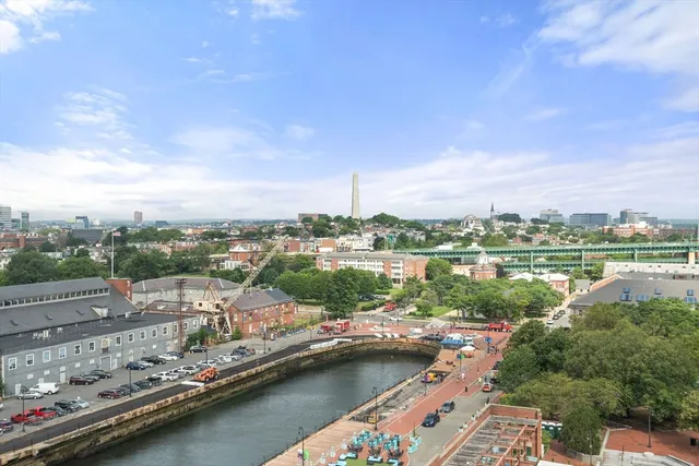 a view of a lake with a city