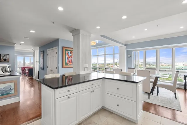 a kitchen with counter top space and sink
