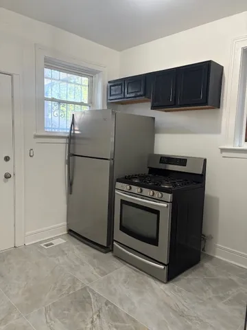 a utility room with washer and dryer