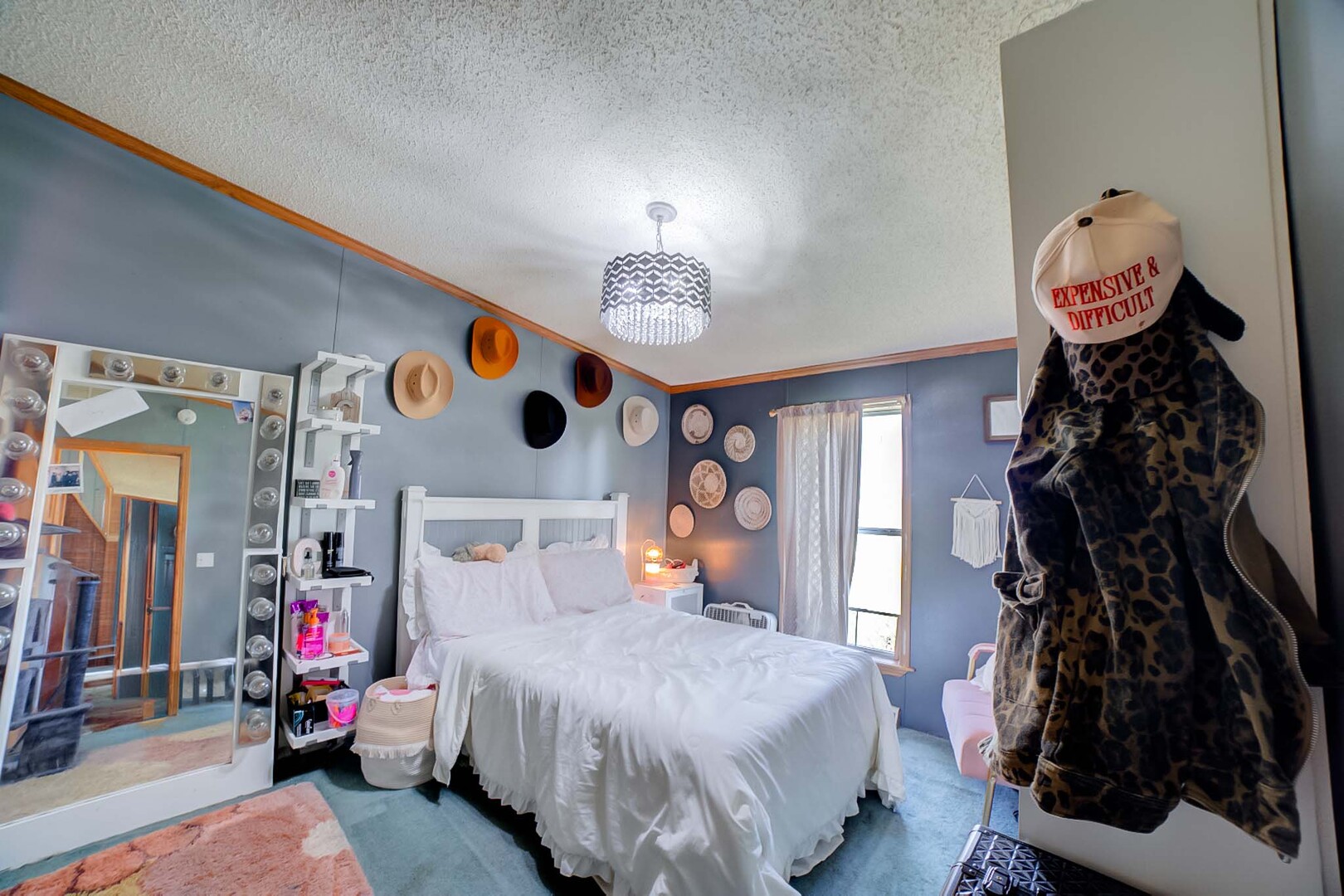 28240 North 990 E Road Potomac, IL 61865 - Photo 19 of 23 a bedroom with a bed and a chandelier