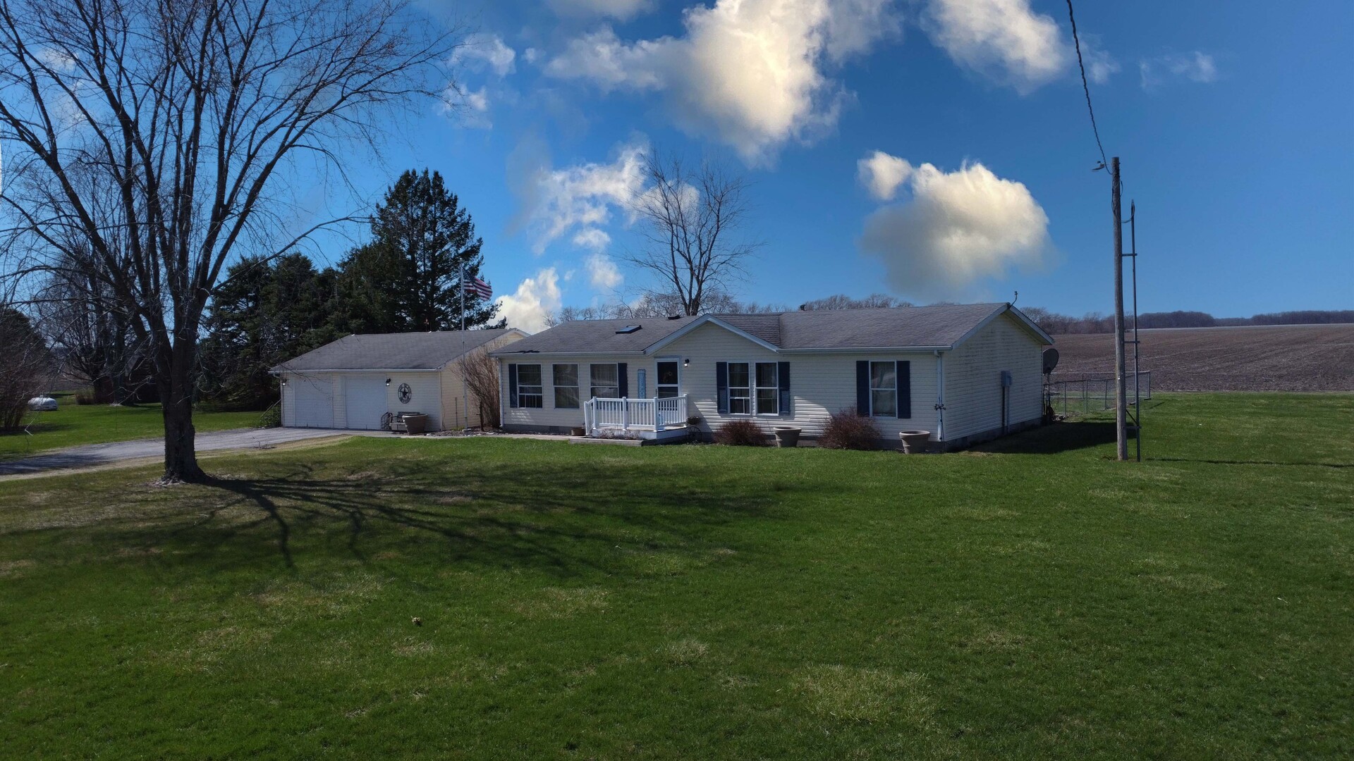 28240 North 990 E Road Potomac, IL 61865 - Photo 2 of 23 a view of a house with a big yard