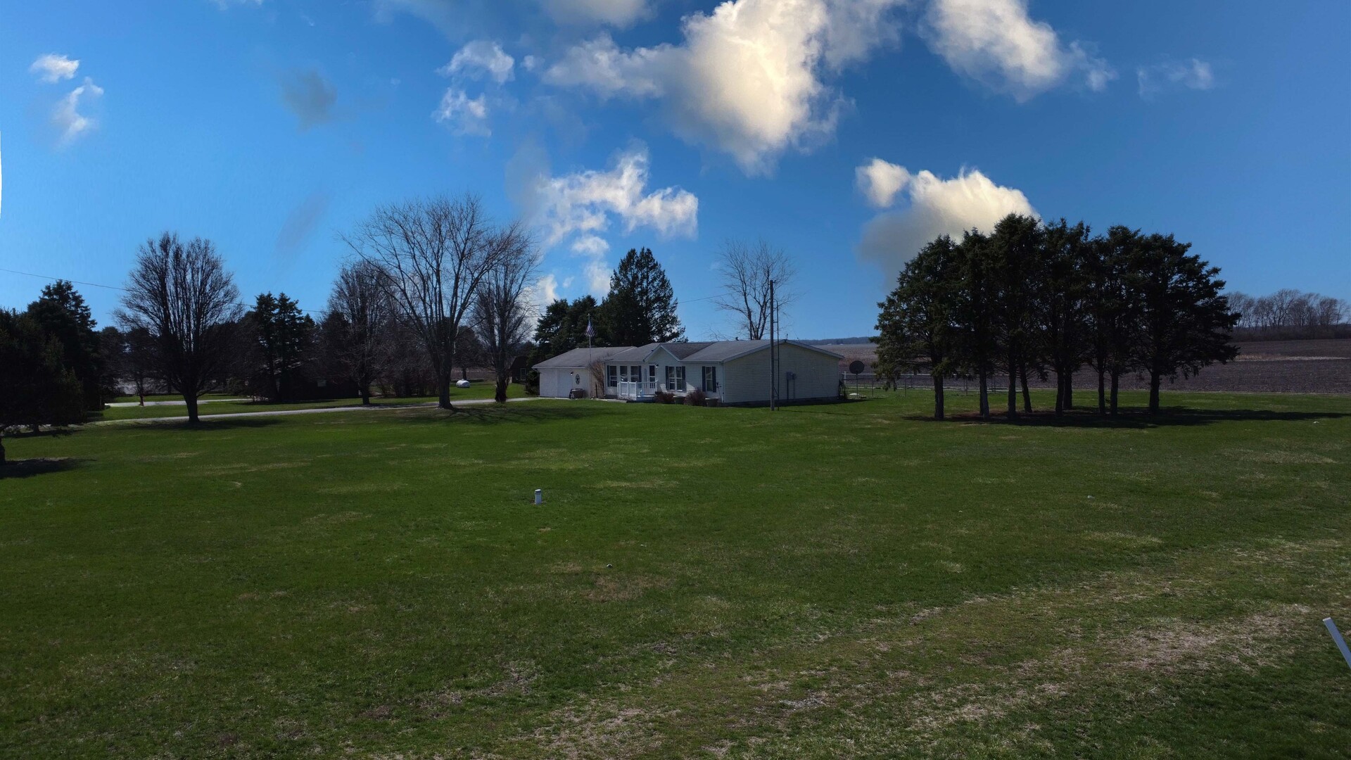28240 North 990 E Road Potomac, IL 61865 - Photo 4 of 23 a view of a golf course with a garden