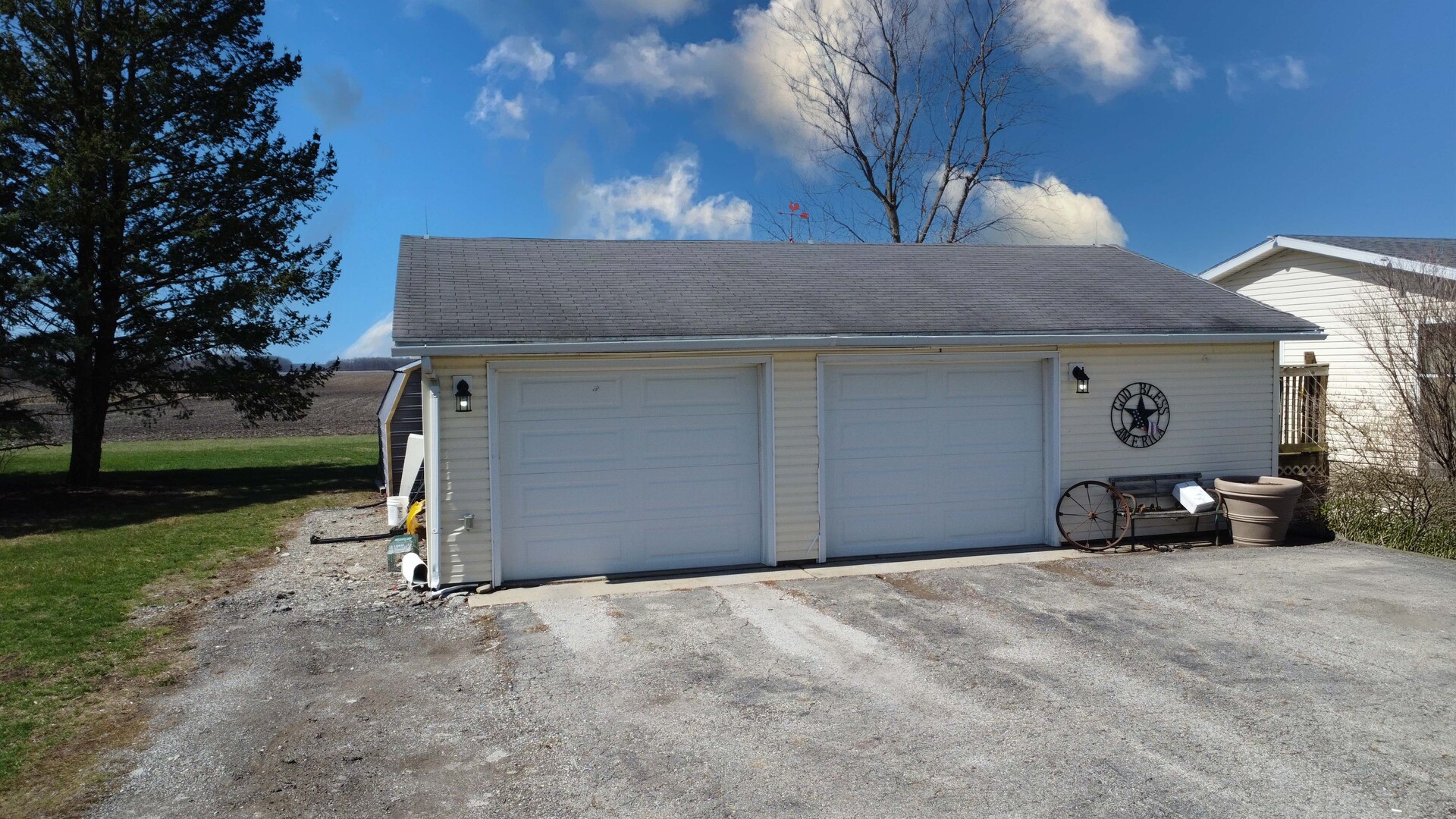 28240 North 990 E Road Potomac, IL 61865 - Photo 7 of 23 a view of a house with a yard and garage