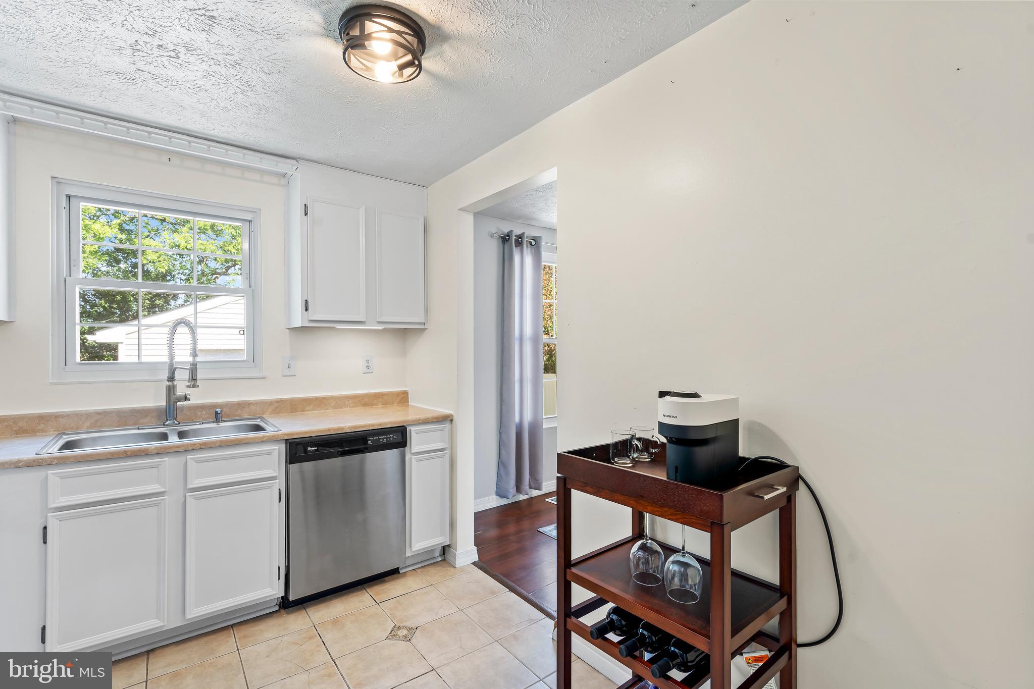 1839 Lawnview Drive Frederick, MD 21702 - Photo 13 of 42 a kitchen with a sink cabinets and window