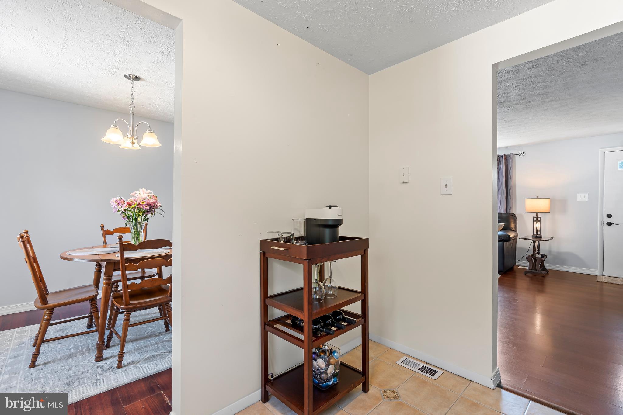 1839 Lawnview Drive Frederick, MD 21702 - Photo 16 of 42 a view of a room with furniture and wooden floor