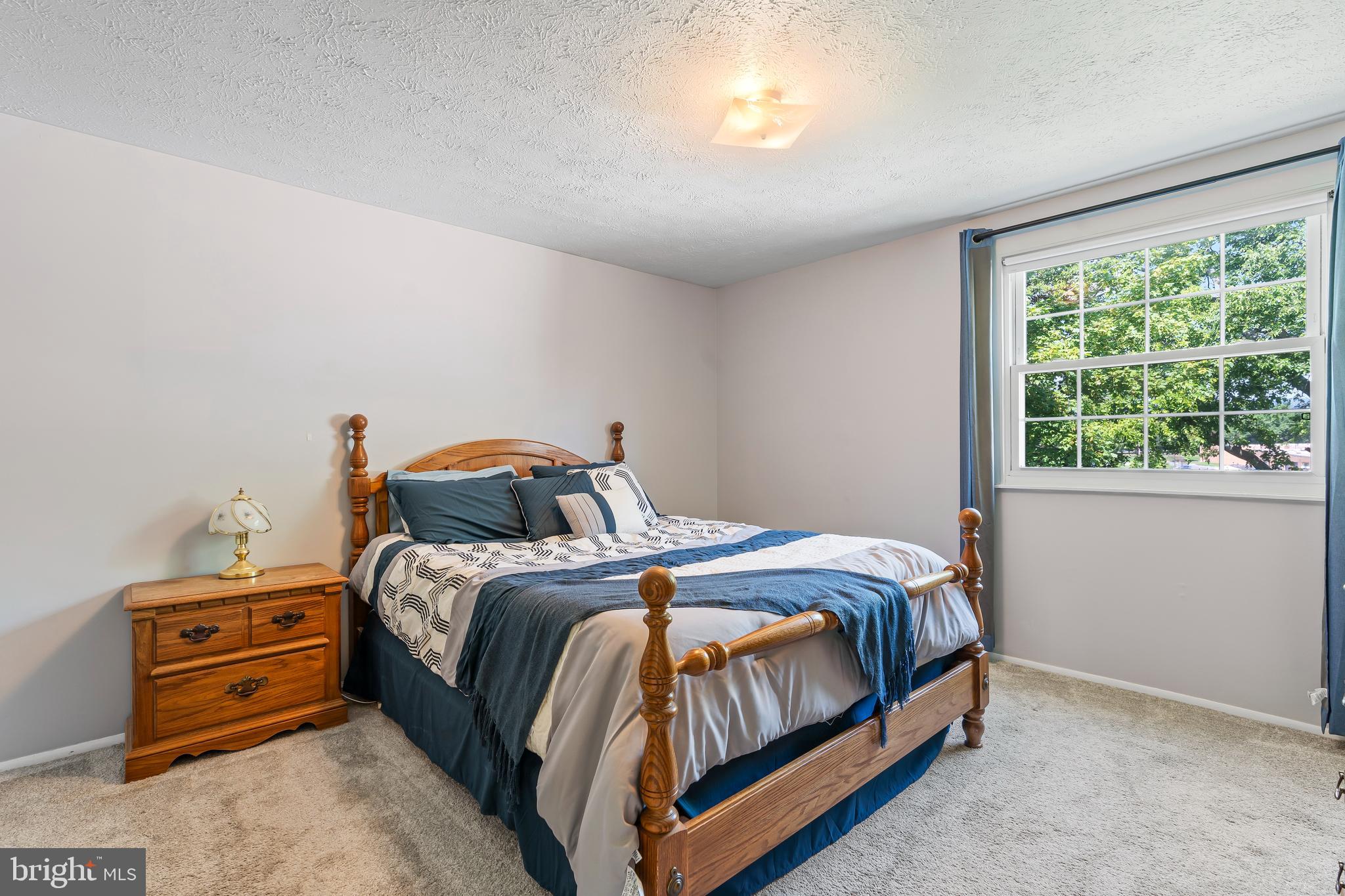 1839 Lawnview Drive Frederick, MD 21702 - Photo 21 of 42 a bedroom with a bed and a window