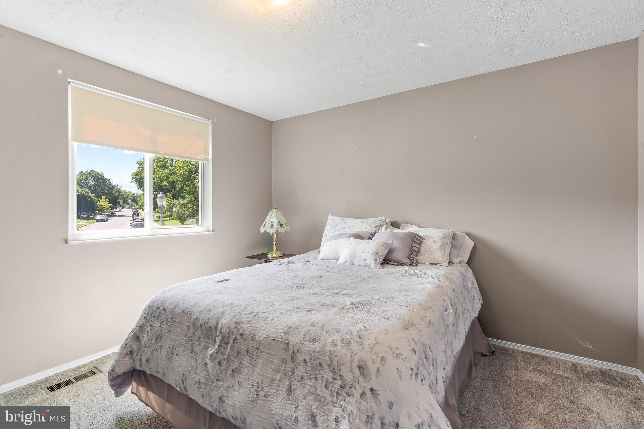 1839 Lawnview Drive Frederick, MD 21702 - Photo 24 of 42 a bedroom with a bed and a window