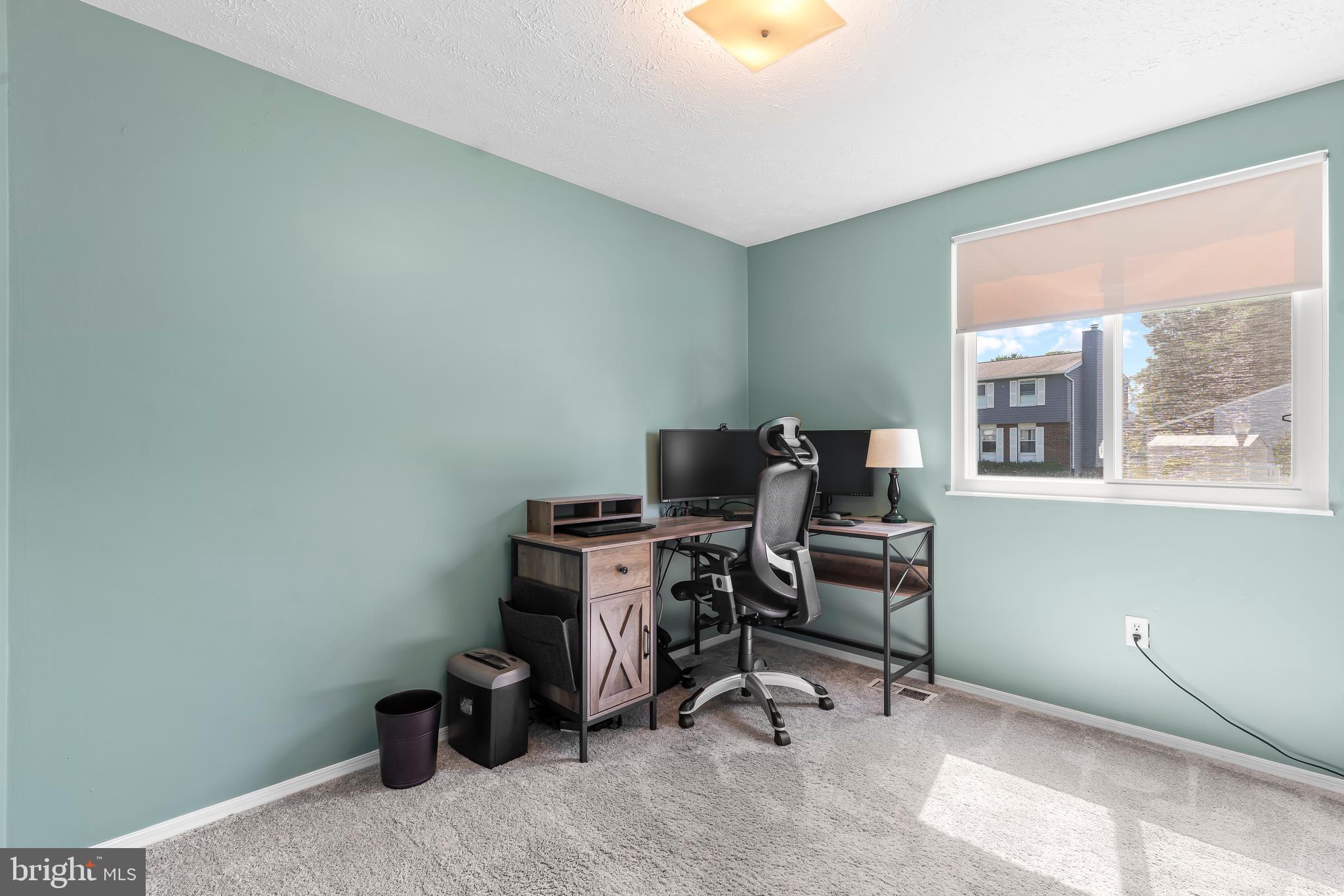 1839 Lawnview Drive Frederick, MD 21702 - Photo 27 of 42 a view of a workspace with furniture and a window