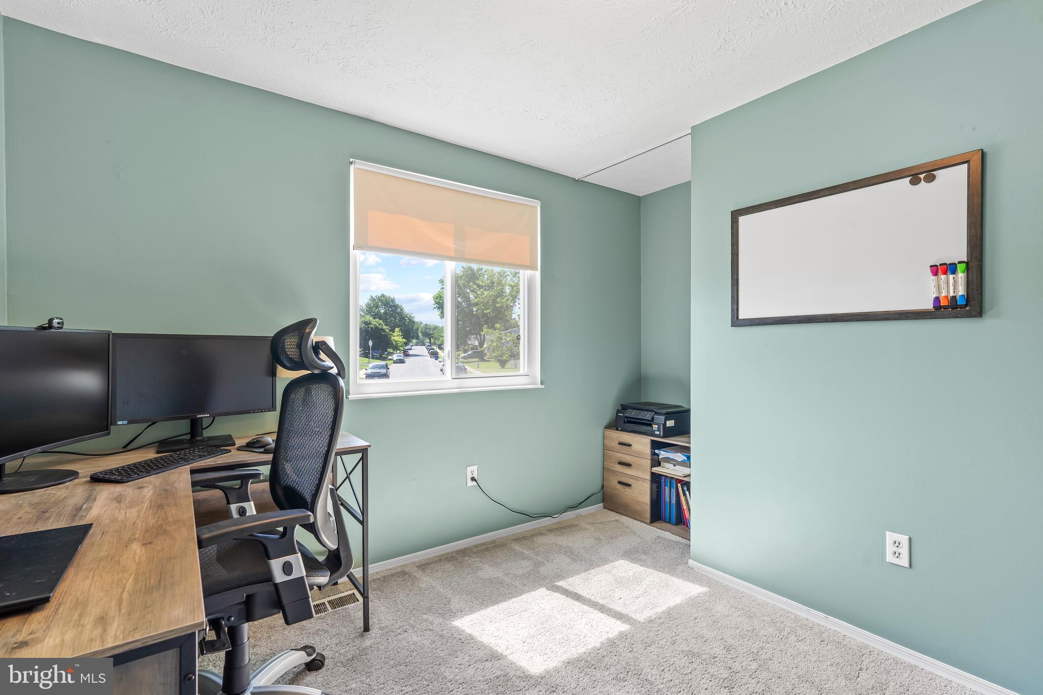 1839 Lawnview Drive Frederick, MD 21702 - Photo 28 of 42 a view of a workspace with furniture and a window