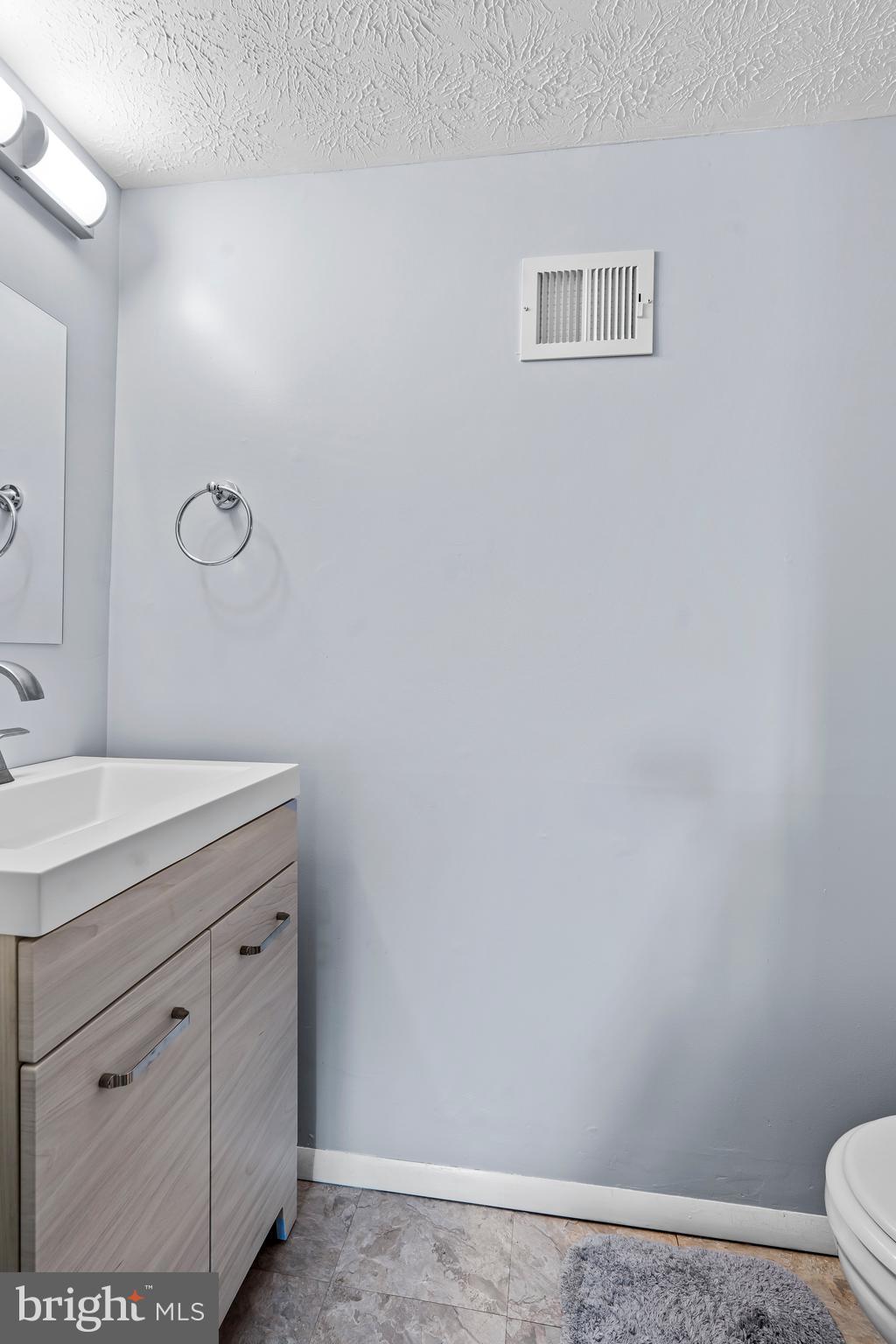 1839 Lawnview Drive Frederick, MD 21702 - Photo 36 of 42 a bathroom with a sink and a toilet