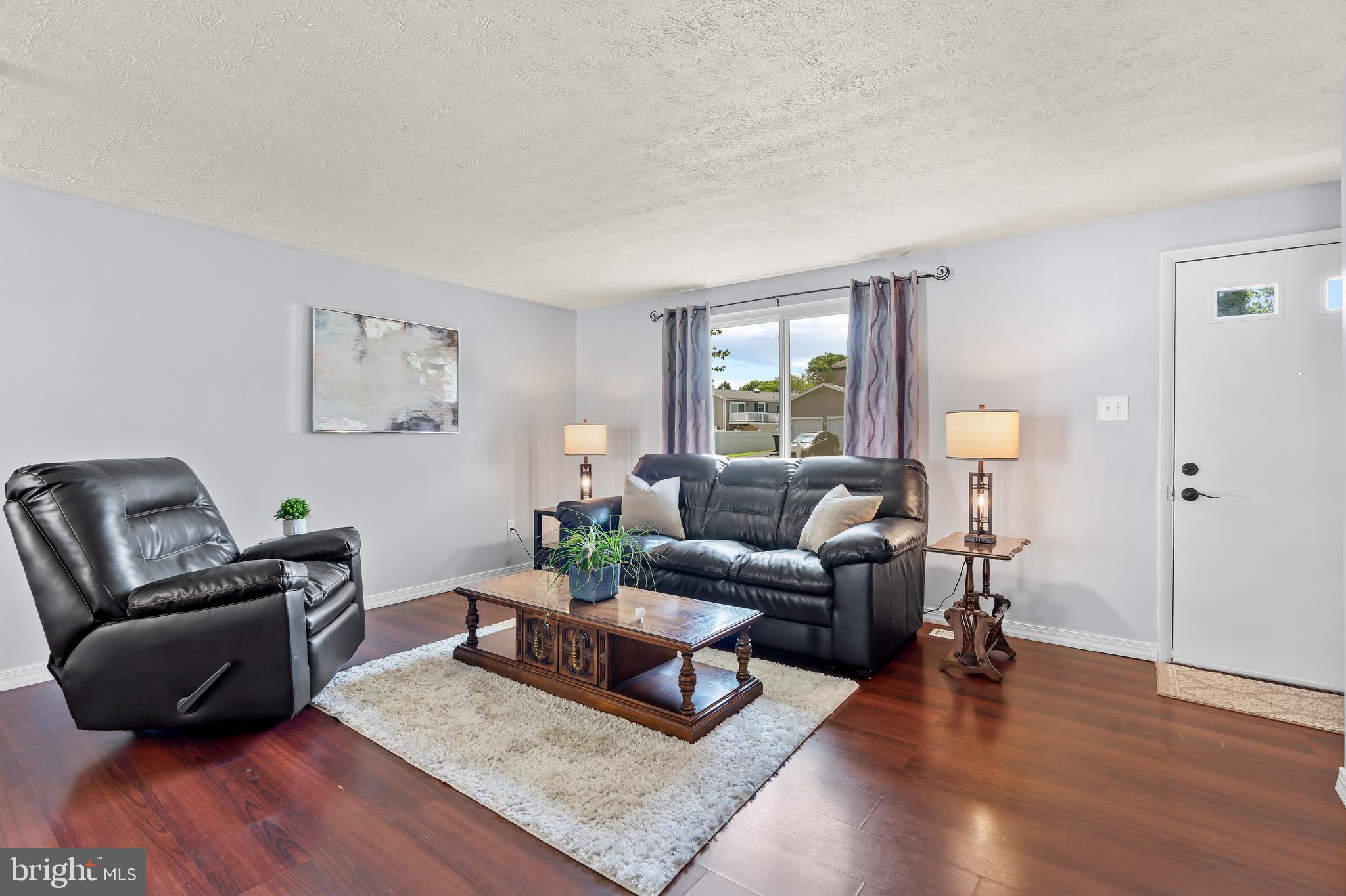 1839 Lawnview Drive Frederick, MD 21702 - Photo 8 of 42 a living room with furniture and wooden floor