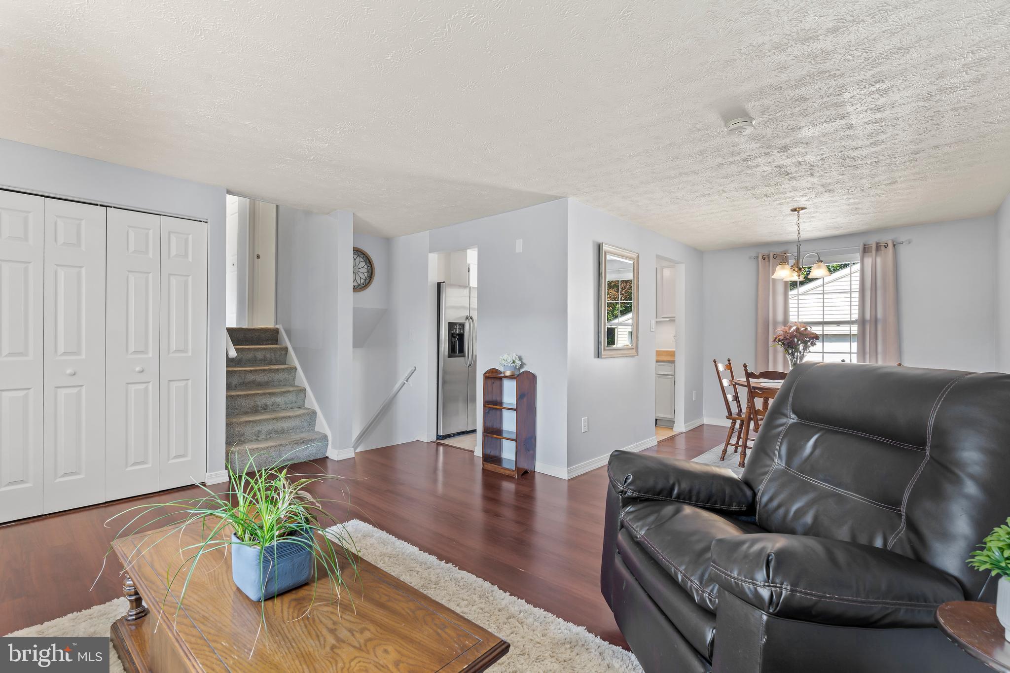 1839 Lawnview Drive Frederick, MD 21702 - Photo 10 of 42 a living room with furniture and wooden floor