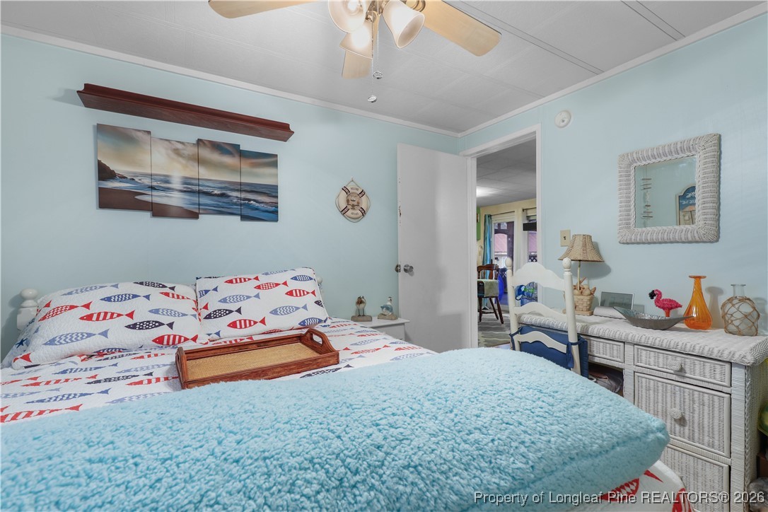 156 Connell Road Carthage, NC 28327 - Photo 19 of 43 a bedroom that has a bed and a dresser in it