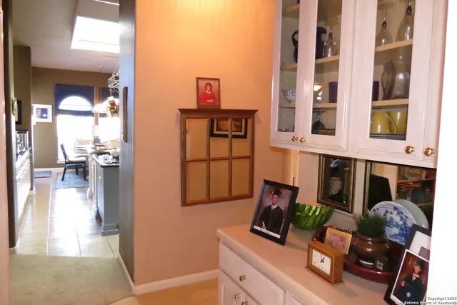 a view of a workspace with furniture and a living room