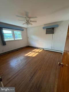 7717 Pearsons Corner Road Dover, DE 19904 - Photo 12 of 17 wooden floor in an empty room