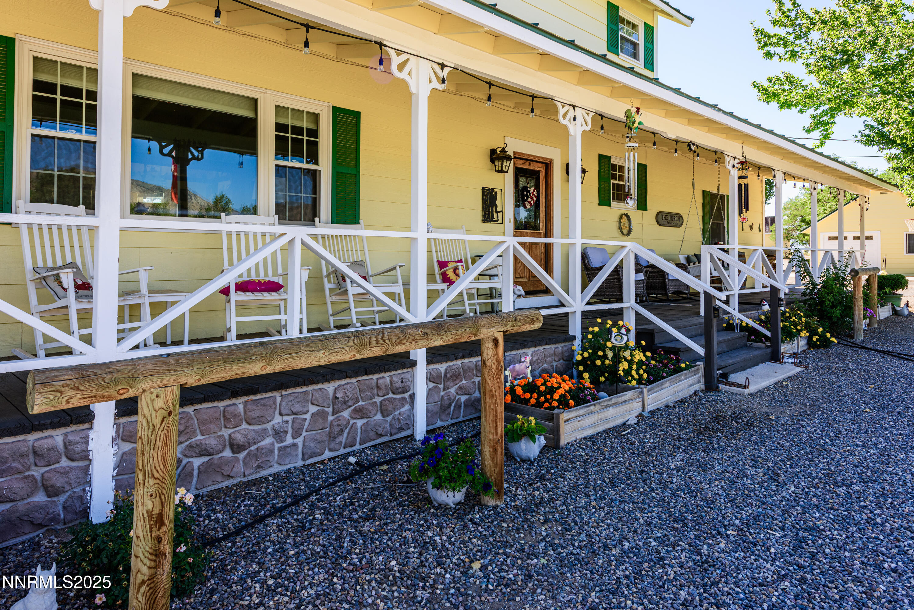 50 Miller Ridge Road Smith Valley, NV 89444 - Photo 3 of 51 a view of a house with wooden deck and furniture
