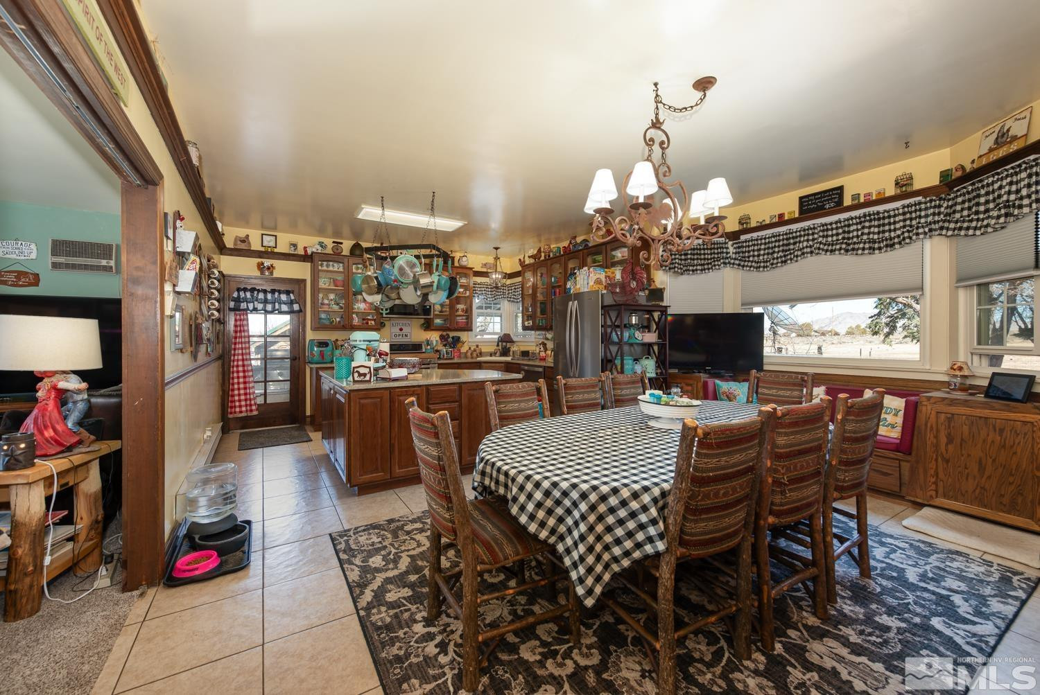 50 Miller Ridge Road Smith Valley, NV 89444 - Photo 41 of 51 a view of a dining room with furniture and chandelier