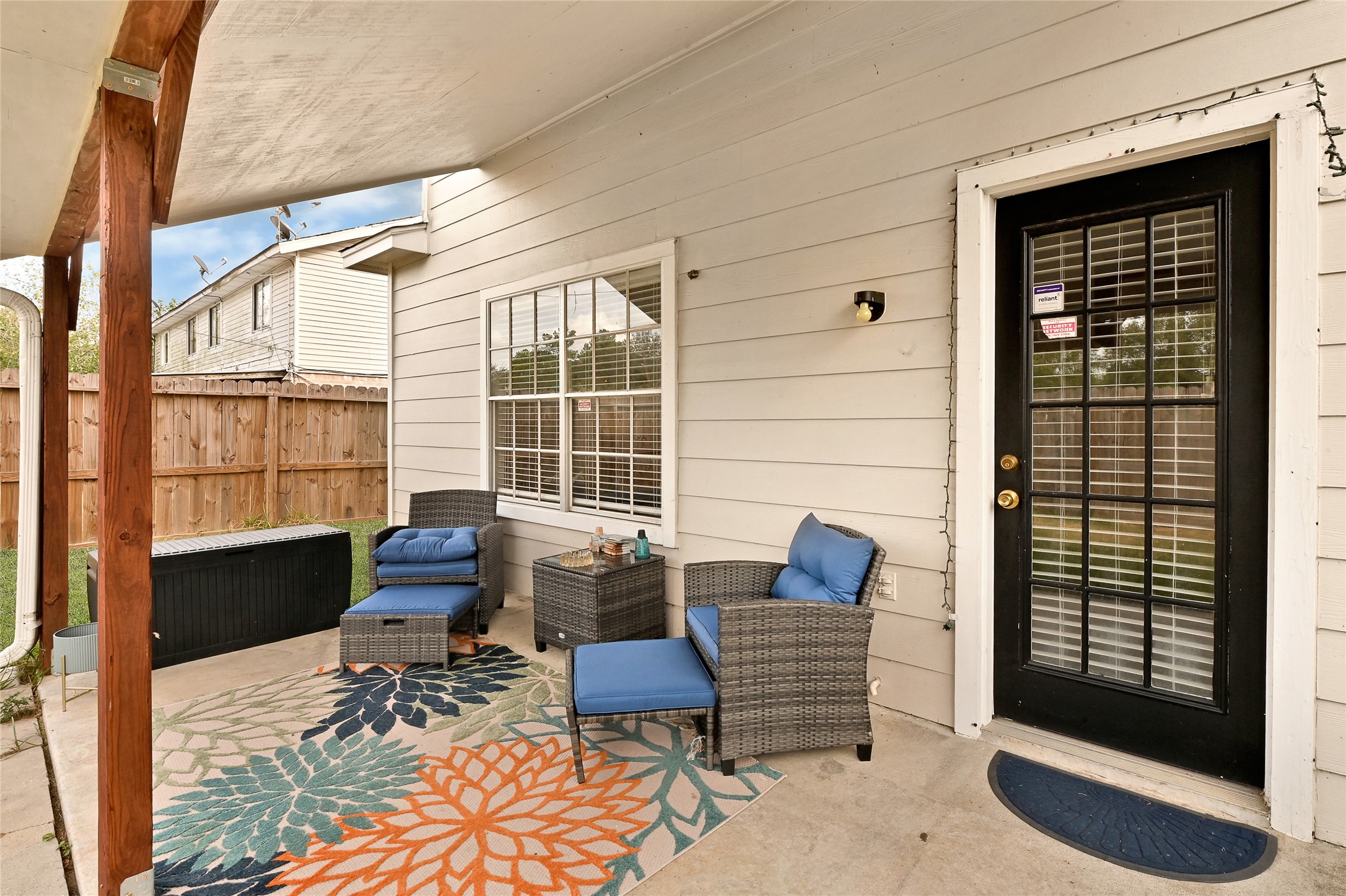 10100 Spring Pl Drive Houston, TX 77070 - Photo 22 of 24 Covered patio providing a comfortable outdoor seating area ideal for relaxing or entertaining.
