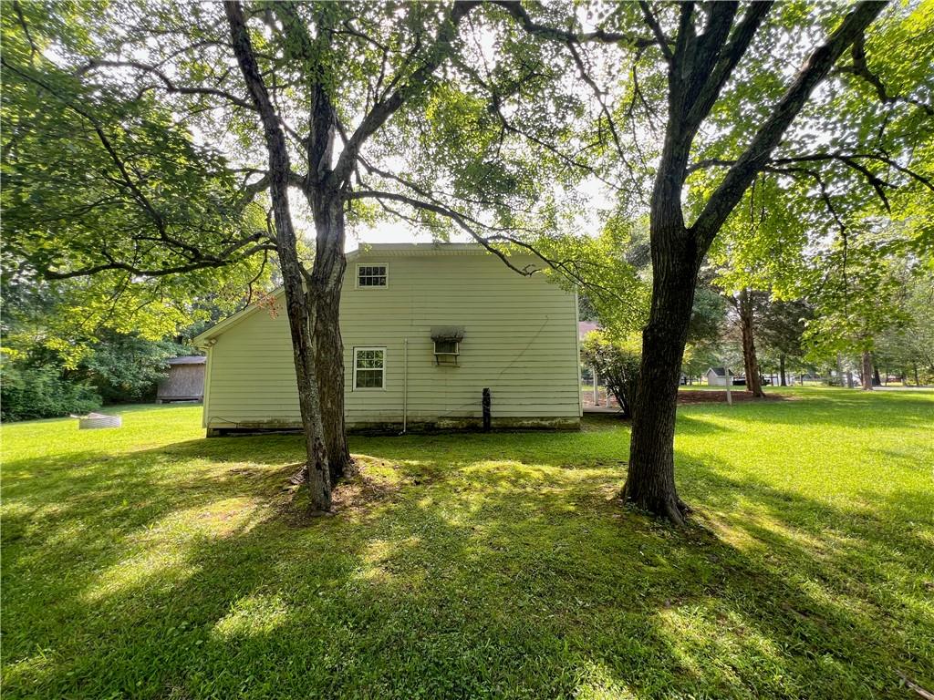 340 Womack Avenue Dallas, GA 30157 - Photo 24 of 29 a view of a trees in front of a house