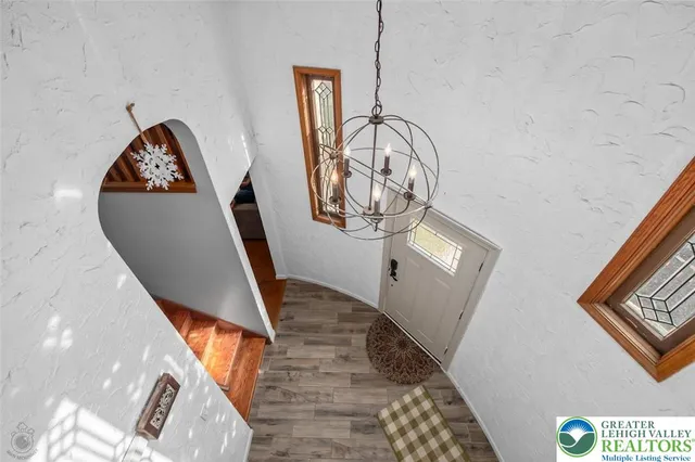 a view of a hallway with washer and dryer