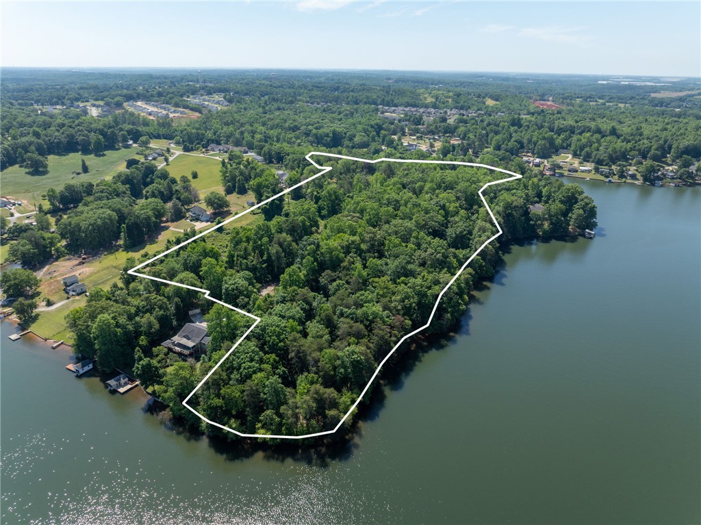 0 Ben Hurt Road Lyman, SC 29365 - Photo 21 of 21 A vast, wooded lot with extensive lake frontage awaits your vision for a serene estate.