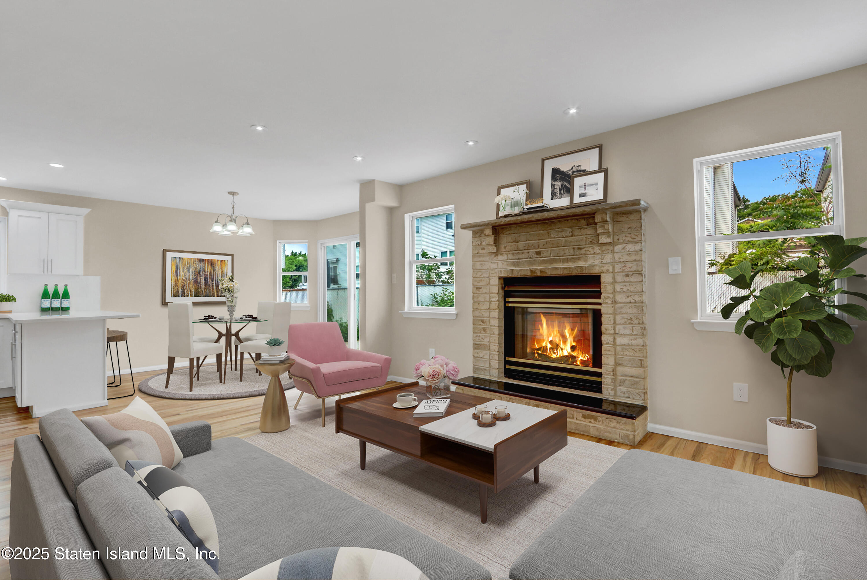 103 Savo Loop Staten Island, NY 10309 - Photo 15 of 46 a living room with furniture and a fireplace