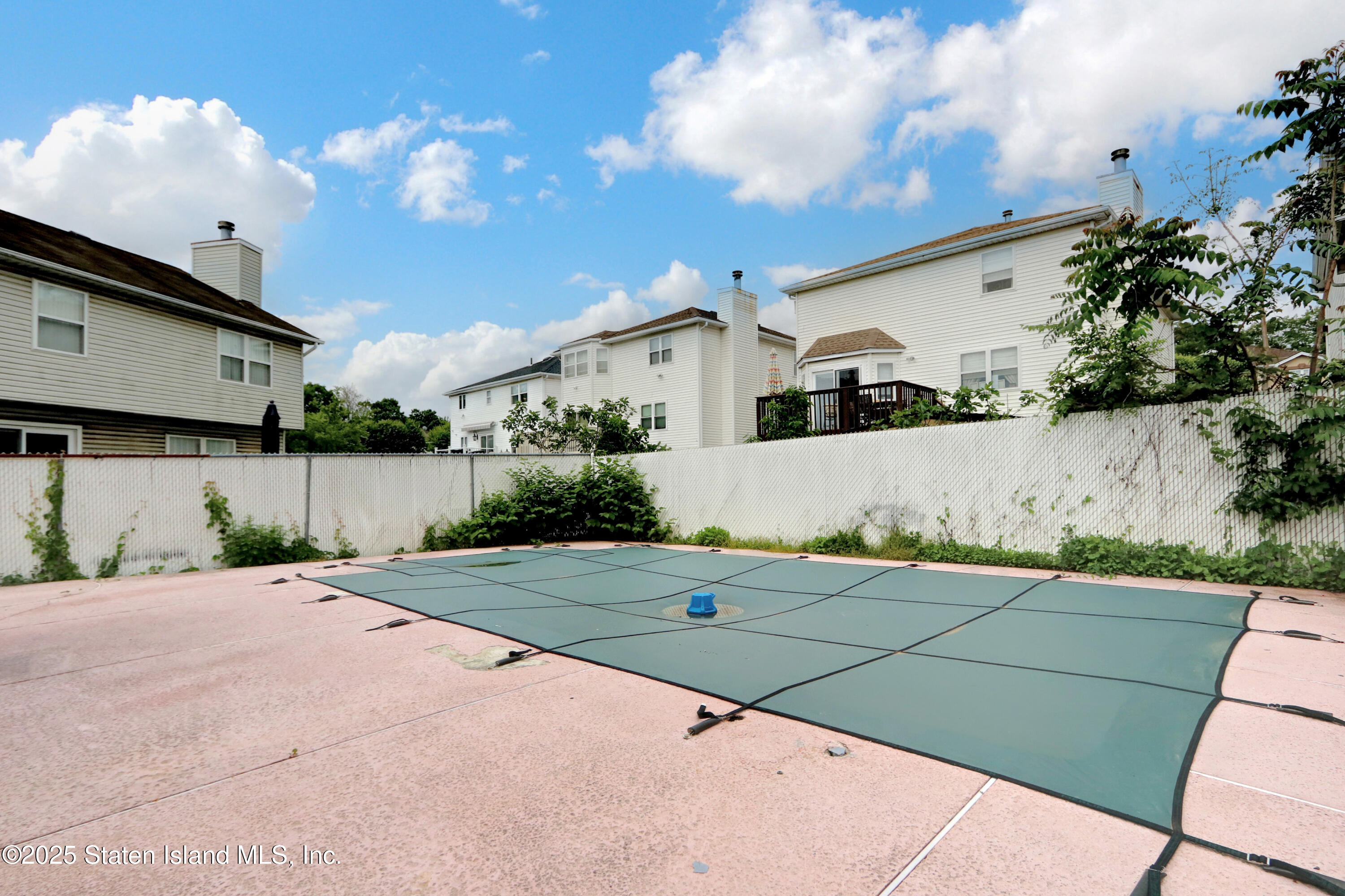 103 Savo Loop Staten Island, NY 10309 - Photo 36 of 46 a view of a yard in front of a building