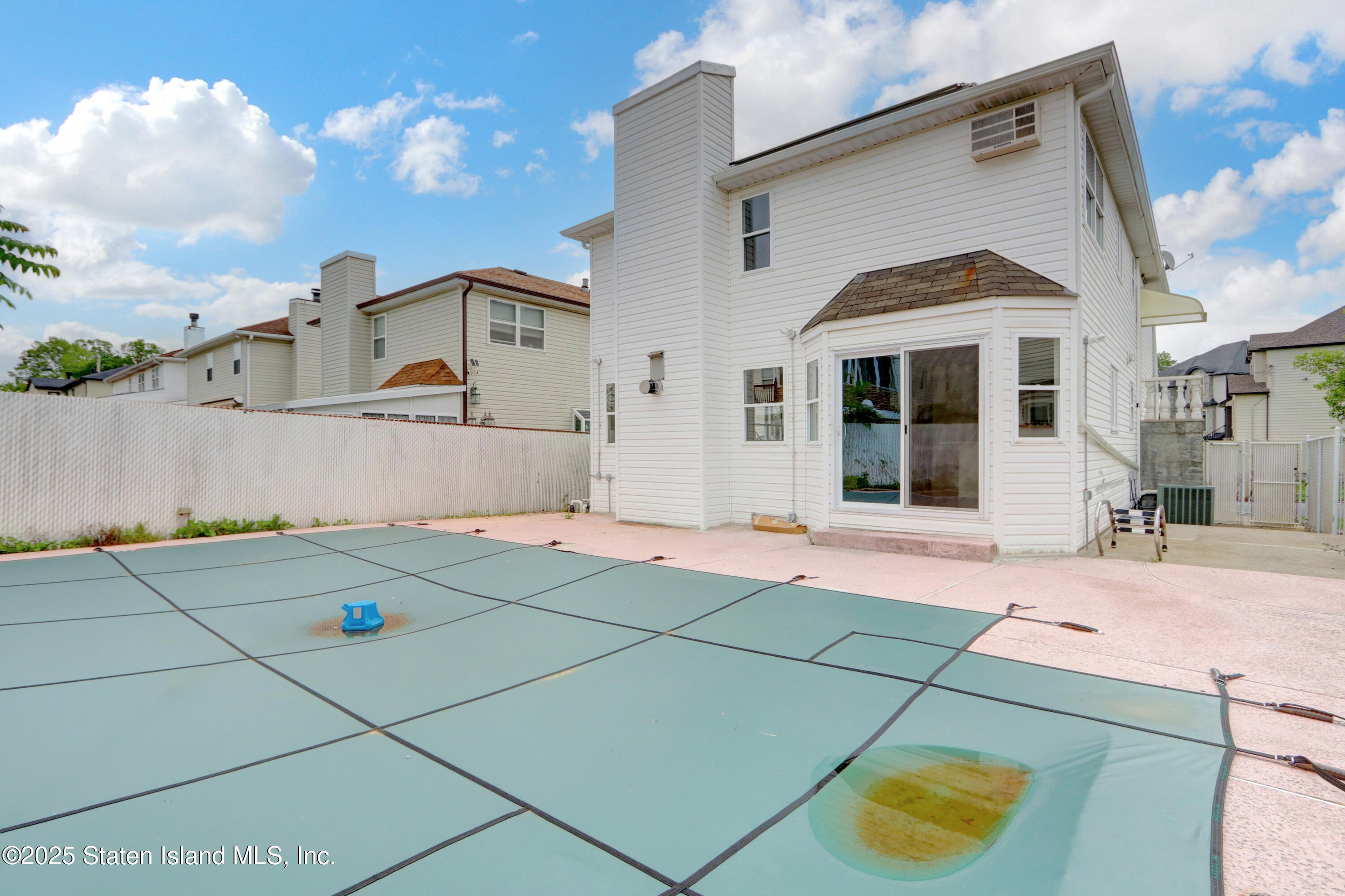 103 Savo Loop Staten Island, NY 10309 - Photo 37 of 46 a front view of a house with a garage
