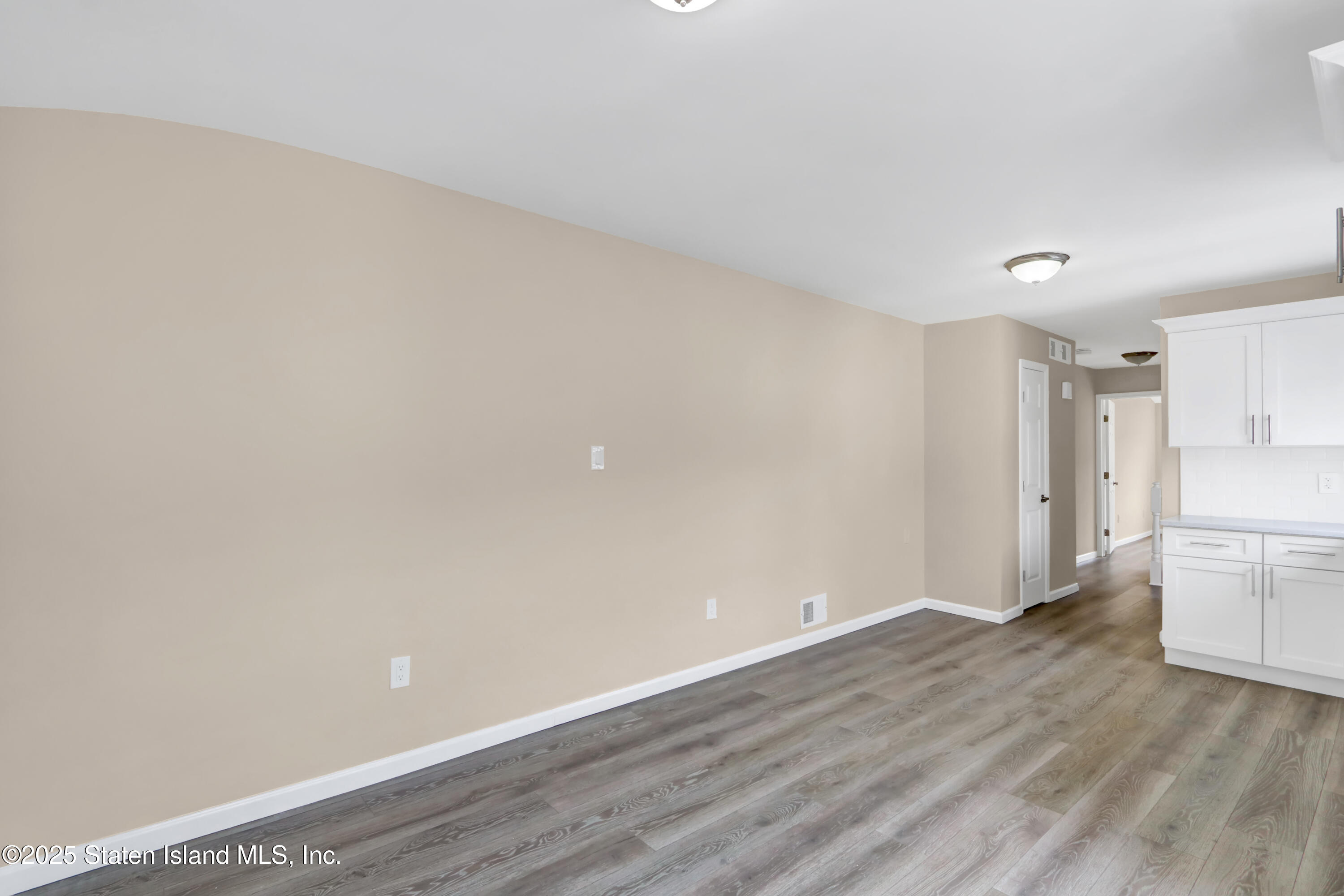 103 Savo Loop Staten Island, NY 10309 - Photo 42 of 46 a view of a kitchen with wooden floor