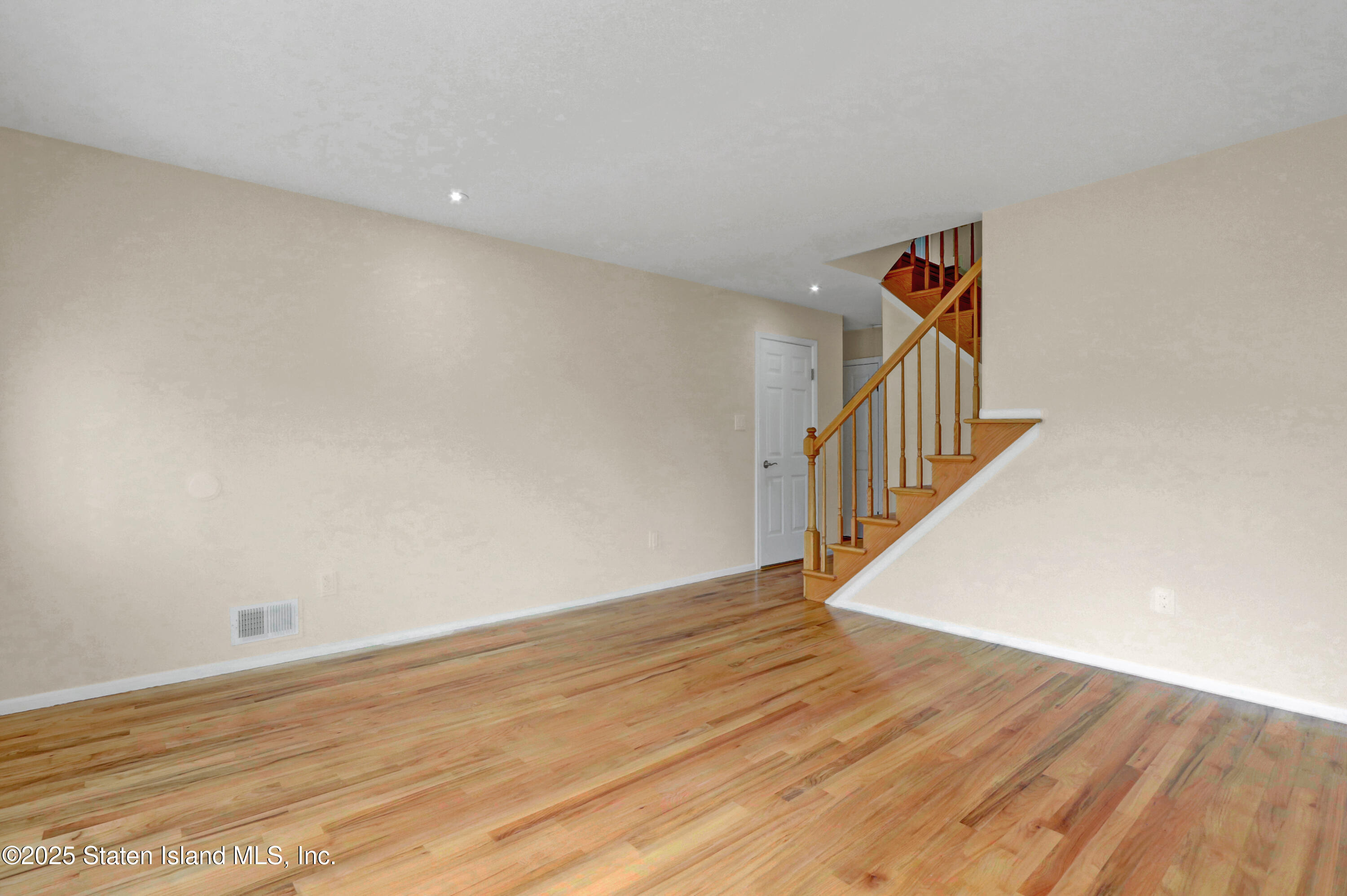 103 Savo Loop Staten Island, NY 10309 - Photo 5 of 46 a view of an entryway with wooden floor