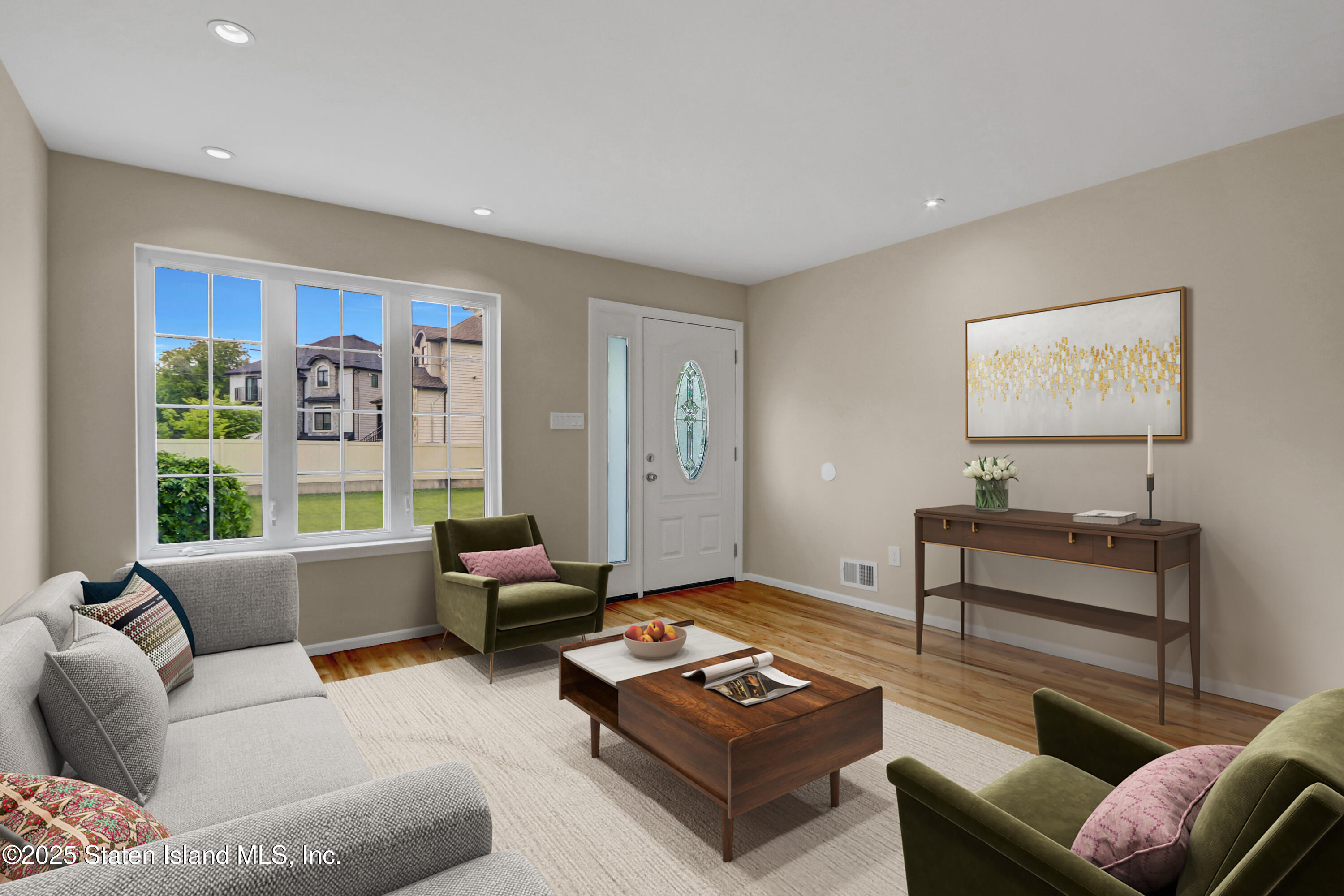 103 Savo Loop Staten Island, NY 10309 - Photo 6 of 46 a living room with furniture and a large window