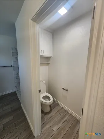 a view of bathroom with toilet