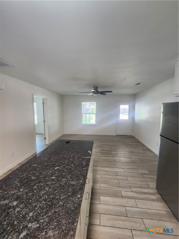 907 East 3rd Street, Unit B Lampasas, TX 76550 - Photo 7 of 19 a view of empty room with window